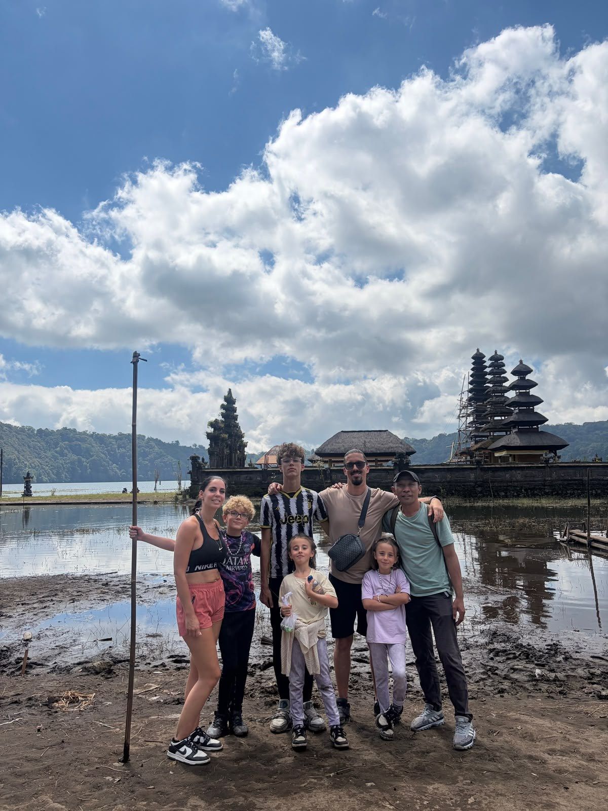 A family at the lakeside temple on Lake Tamblingan